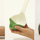 Image for article titled A Semi-Soft Silicone Ladle Would Scoop Out Every Last Drop